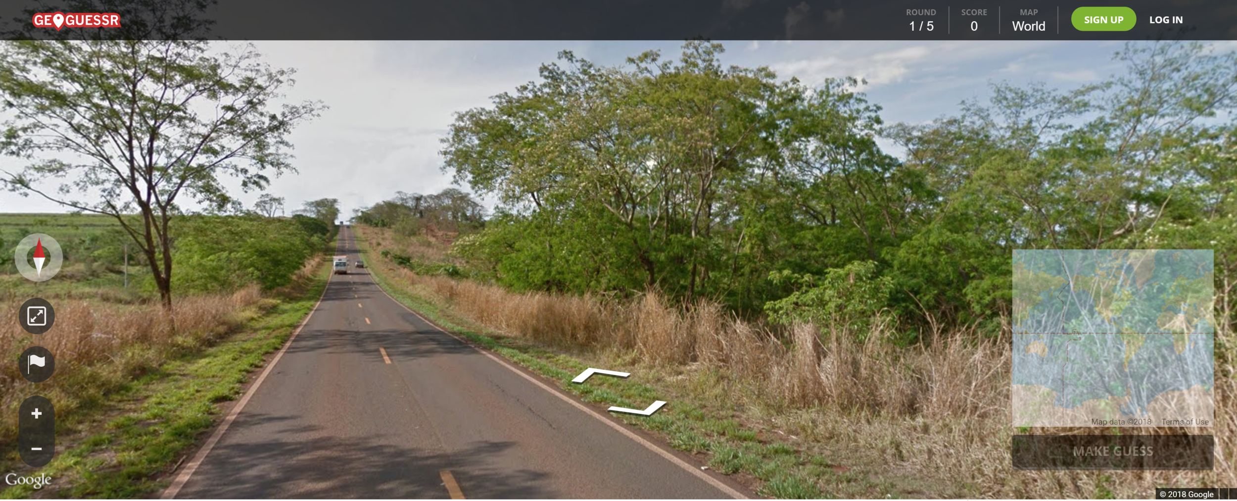A screenshot from the game GeoGuesser showing a road on Google Maps